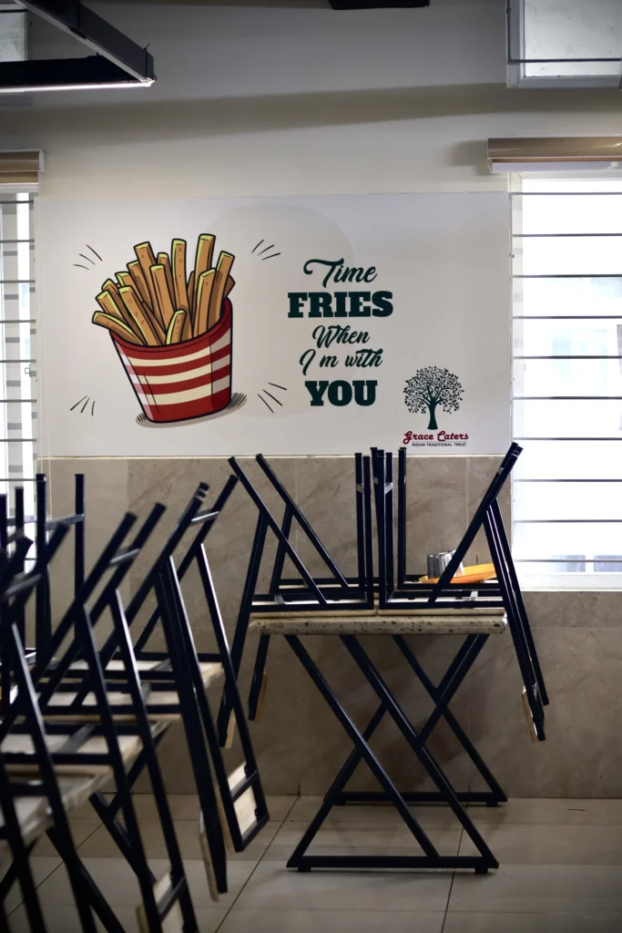 Signage — hand-lettered “Time Fries” graphic in the dining bay