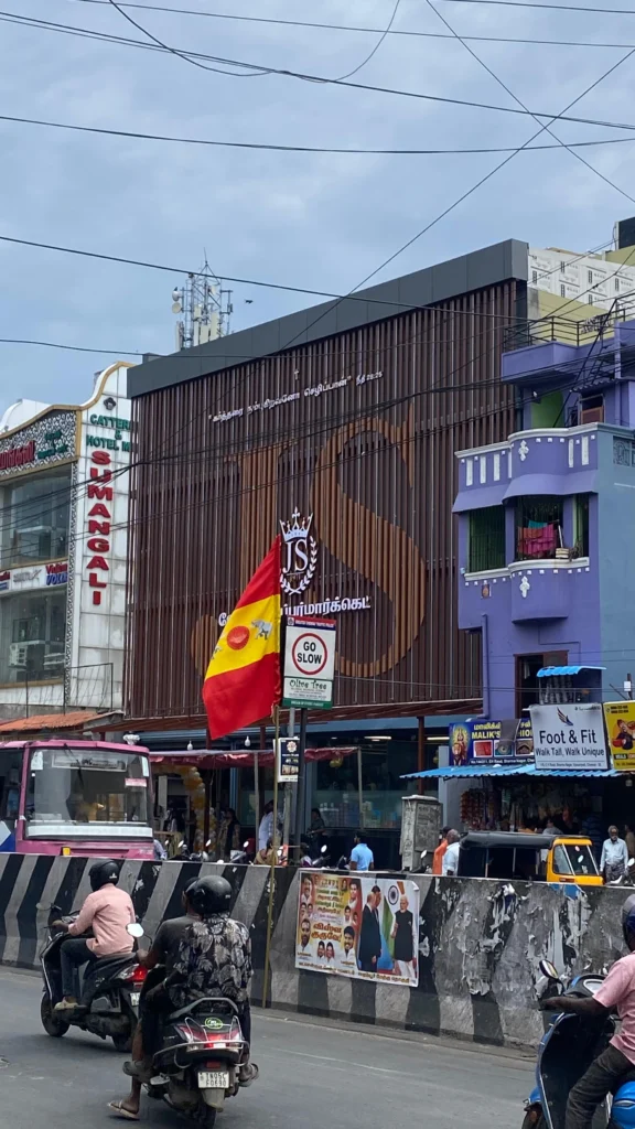 Street presence — the screen anchoring its block on the Vyasarpadi road