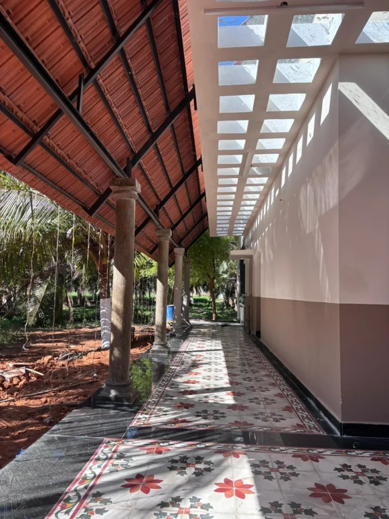 Verandah — Athangudi tile and Kota stone under the folded roof